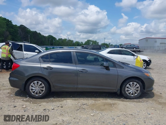 2012 Honda Civic LX z VIN 19XFB2F54CE038958, wystawiony jako IAAI lot #42136832 z przebiegiem 154 822 mil mil oraz . Historia ofert i sprzedaży dostępna na DreamBid. Obrazek 13.