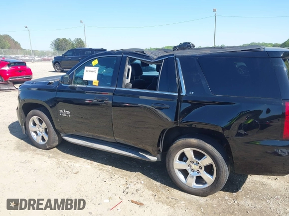 2015 Chevrolet Tahoe LT with VIN 1GNSCBKC8FR268891, listed as a IAAI auction lot 41964602 with 175,035 mi miles and . Bid and sale history available at DreamBid. Image 6.