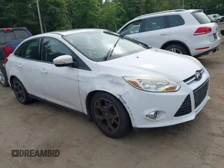 2013 Ford Focus SE z VIN 1FADP3F2XDL254316, wystawiony jako IAAI lot #42473647 z przebiegiem 65 422 mil mil oraz . Historia ofert i sprzedaży dostępna na DreamBid. Obrazek 1.