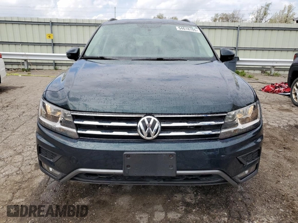2018 Volkswagen Tiguan S with VIN 3VV0B7AX2JM017137, listed as a Copart auction lot 54618705 with 69,026 mi miles and Clean Title. Bid and sale history available at DreamBid. Image 5.