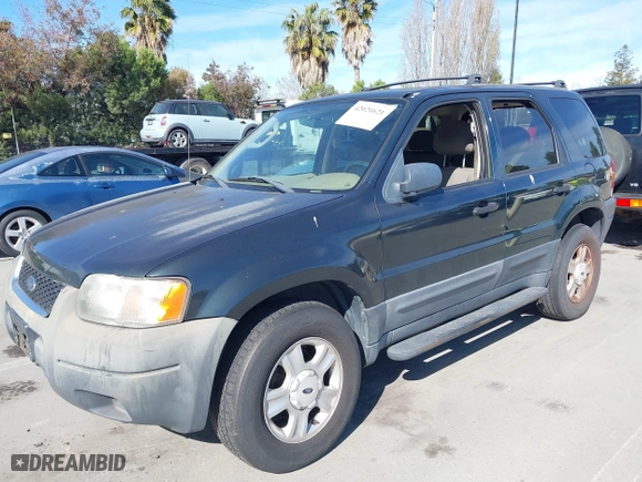 2004 Ford Escape XLT with VIN 1FMCU03184DA00828, listed as a IAAI auction lot 42021621 with 164,667 mi miles. Bid and sale history available at carsss.com. Image 6.
