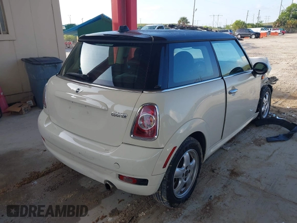 2011 MINI Hardtop with VIN WMWSU3C5XBT095591, listed as a IAAI auction lot 42366393 with 99,092 mi miles and . Bid and sale history available at DreamBid. Image 4.