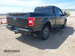 2018 Ford F-150 XL with VIN 1FTEX1EP7JFC21008, listed as a IAAI auction lot 42072145 with 102,679 mi miles and . Bid and sale history available at DreamBid. Image 4.