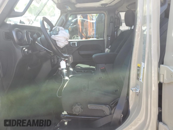 2020 Jeep Gladiator Sport S with VIN 1C6HJTAG5LL161239, listed as a Copart auction lot 60348605 with 35,333 mi miles and Salvage title. Bid and sale history available at DreamBid. Image 7.