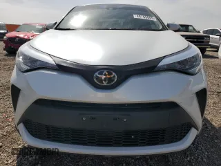2022 Toyota C-HR XLE with VIN JTNKHMBX6N1134656, listed as a Copart auction lot 48765065 with 14,456 mi miles and Salvage Title. Bid and sale history available at carsss.com. Image 5.