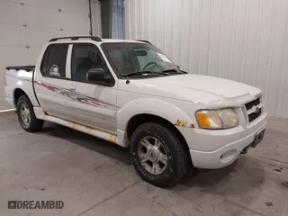 2004 Ford Explorer Sport Trac XLS with VIN 1FMZU77K14UA70614, listed as a IAAI auction lot 41501539 with 214,179 mi miles. Bid and sale history available at carsss.com. Image 1.