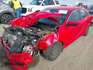 2018 Honda Civic LX with VIN 2HGFC2F58JH542199, listed as a IAAI auction lot 41707383 with 80,698 mi miles and . Bid and sale history available at carsss.com. Image 2.