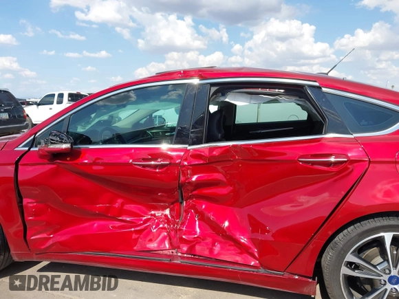 2017 Ford Fusion Titanium with VIN 3FA6P0K98HR207447, listed as a IAAI auction lot 42422213 with 59,549 mi miles and . Bid and sale history available at DreamBid. Image 14.