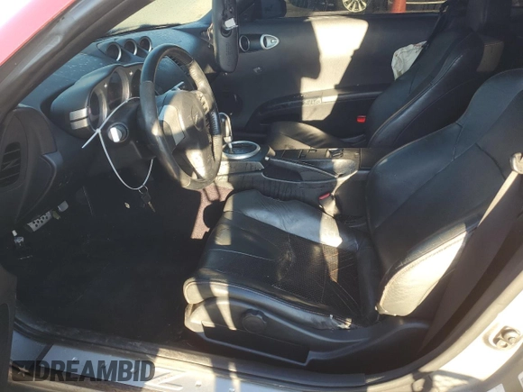 2004 Nissan 350Z Touring with VIN JN1AZ34E84T051139, listed as a Copart auction lot 74269504 with 148,272 mi miles and Salvage Title. Bid and sale history available at carsss.com. Image 7.