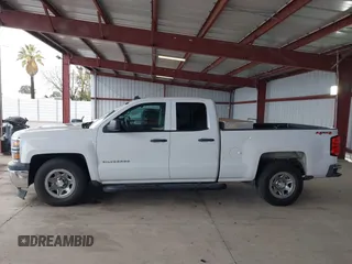 2014 Chevrolet Silverado 1500 Work Truck with VIN 1GCVKPEH7EZ313525, listed as a IAAI auction lot 41825247 with 227,392 mi miles and . Bid and sale history available at DreamBid. Image 14.