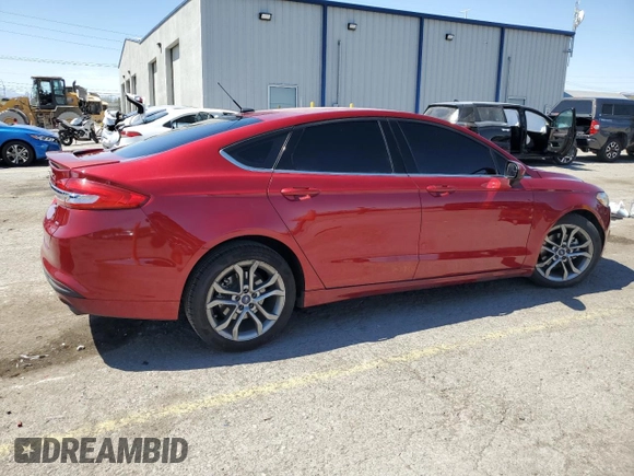 2017 Ford Fusion SE z VIN 3FA6P0H77HR413851, wystawiony jako Copart lot #51806965 z przebiegiem 98 269 mil mil oraz Szkoda całkowita • Salvage title. Historia ofert i sprzedaży dostępna na DreamBid. Obrazek 3.