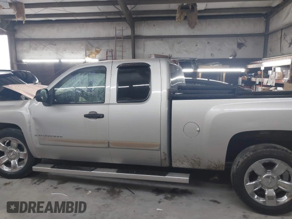 2007 Chevrolet Silverado 1500 Work Truck with VIN 2GCEC19C771603879, listed as a IAAI auction lot 42086392 with 307,745 mi miles and . Bid and sale history available at DreamBid. Image 14.