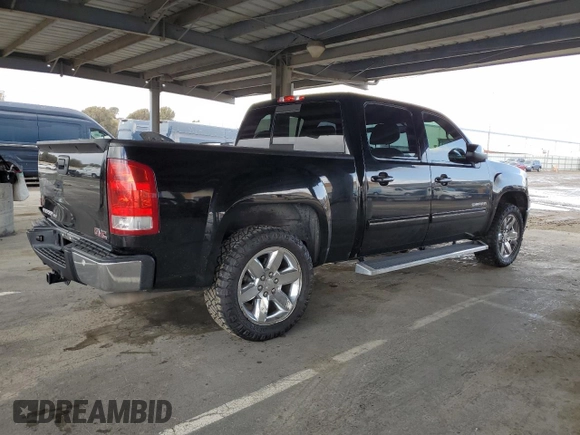 2012 GMC Sierra 1500 with VIN 3GTP1WE22CG290959, listed as a Copart auction lot 49271025 with 153,733 mi miles and Salvage Title. Bid and sale history available at DreamBid. Image 3.