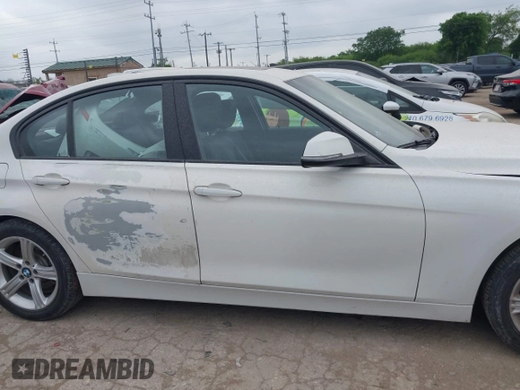2014 BMW 3 Series 320i xDrive with VIN WBA3C3C52EP661389, listed as a IAAI auction lot 42160042 with 131,997 mi miles and . Bid and sale history available at DreamBid. Image 14.