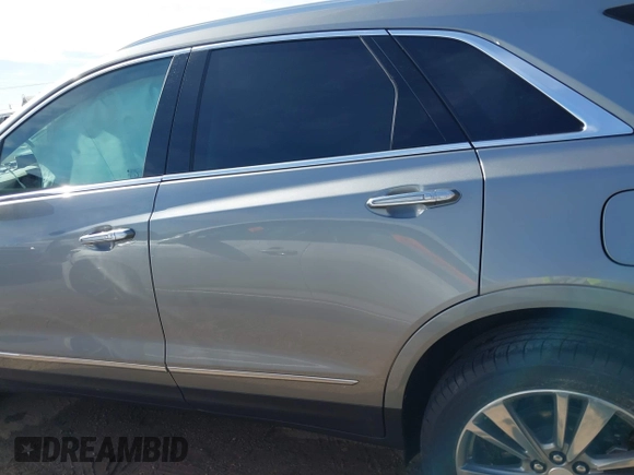 2025 Cadillac XT5 FWD Premium Luxury with VIN 1GYKNCRS1SZ120351, listed as a IAAI auction lot 41334881 with 4,915 mi miles. Bid and sale history available at carsss.com. Image 14.