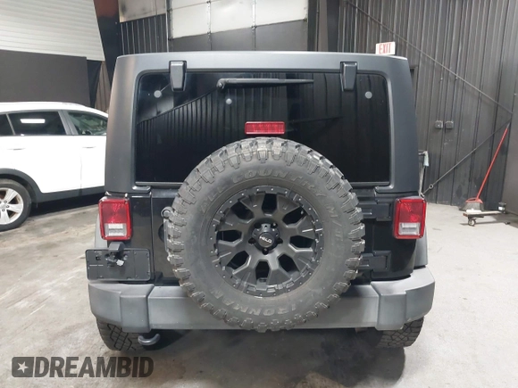 2015 Jeep Wrangler Unlimited Willys Wheeler with VIN 1C4BJWDG1FL749803, listed as a IAAI auction lot 41995132 with 156,595 mi miles and . Bid and sale history available at DreamBid. Image 17.