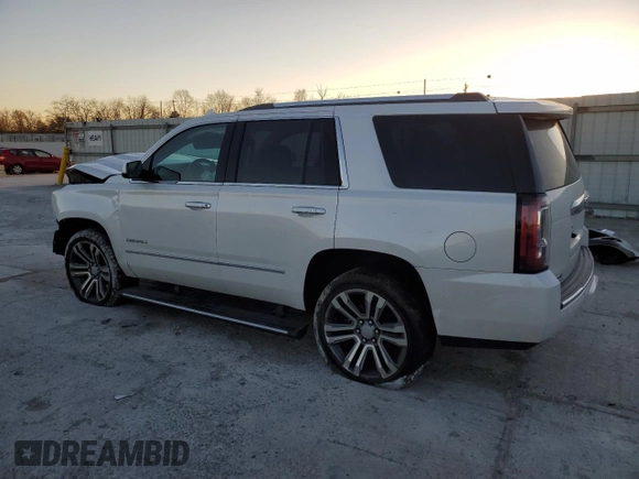 2019 GMC Yukon Denali with VIN 1GKS2CKJ9KR119887, listed as a Copart auction lot 83589544 with 86,754 mi miles and Salvage Title. Bid and sale history available at carsss.com. Image 2.