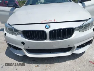 2015 BMW 4 Series 428i xDrive z VIN WBA3N5C58FK198825, wystawiony jako IAAI lot #41919172 z przebiegiem 125 421 mil mil oraz . Historia ofert i sprzedaży dostępna na DreamBid. Obrazek 6.