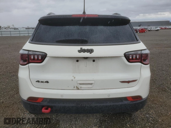 2019 Jeep Compass Trailhawk with VIN 3C4NJDDB4KT790351, listed as a Copart auction lot 48588285 with 67,417 mi miles and Salvage Title. Bid and sale history available at DreamBid. Image 6.
