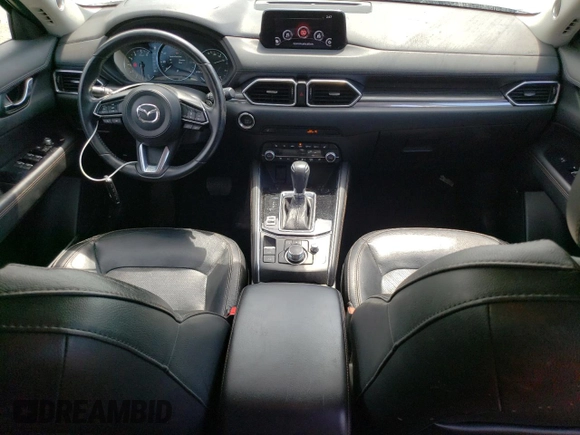 2020 Mazda CX-5 Grand Touring with VIN JM3KFBDM0L0767634, listed as a Copart auction lot 54433935 with 57,901 mi miles and Salvage Title. Bid and sale history available at carsss.com. Image 8.