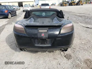 2009 Saturn Sky Red Line z VIN 1G8MT35X19Y106675, wystawiony jako Copart lot #53101595 z przebiegiem 155 314 mil mil oraz Tytuł czysty. Historia ofert i sprzedaży dostępna na DreamBid. Obrazek 6.