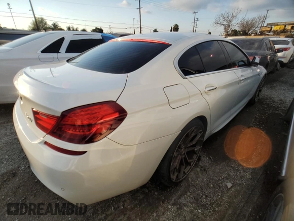 2013 BMW 6 Series 640i with VIN WBA6A0C50DDF14086, listed as a Copart auction lot 42547825 with 236,861 mi miles and Clean Title. Bid and sale history available at DreamBid. Image 3.