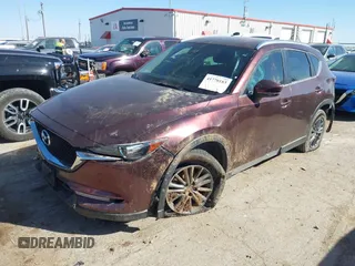 2019 Mazda CX-5 Sport with VIN JM3KFABM2K0686372, listed as a IAAI auction lot 41770183 with 57,202 mi miles and . Bid and sale history available at DreamBid. Image 17.