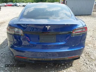 2022 Tesla Model S with VIN 5YJSA1E55NF486443, listed as a IAAI auction lot 42720110 with Not provided miles and . Bid and sale history available at DreamBid. Image 17.