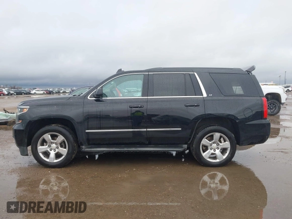 2015 Chevrolet Tahoe LT with VIN 1GNSCBKC2FR632139, listed as a IAAI auction lot 41553087 with 142,775 mi miles and . Bid and sale history available at DreamBid. Image 14.