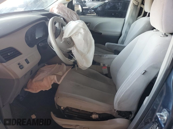 2014 Toyota Sienna LE AAS with VIN 5TDKK3DC3ES406304, listed as a Copart auction lot 54184135 with 164,658 mi miles and Salvage Title. Bid and sale history available at DreamBid. Image 7.