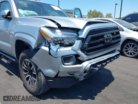 2022 Toyota Tacoma SR with VIN 3TYAX5GN4NT037625, listed as a IAAI auction lot 42382411 with 49,703 mi miles and . Bid and sale history available at DreamBid. Image 6.