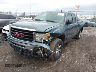 2009 GMC Sierra 1500 SLE with VIN 1GTEK29009Z214672, listed as a IAAI auction lot 41941003 with 165,546 mi miles. Bid and sale history available at carsss.com. Image 2.
