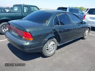 1999 Saturn SL с VIN 1G8ZK5274XZ304652, выставлен на аукционе IAAI как лот 42618620 с пробегом 98 131 миль миль и . История ставок и продаж доступна на DreamBid. Изображение 6.