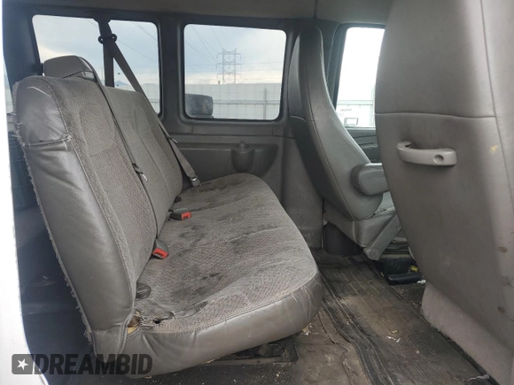 2014 Chevrolet Express Passenger LT with VIN 1GAZG1FGXE1157798, listed as a Copart auction lot 64301595 with 272,982 mi miles and Clean title. Bid and sale history available at DreamBid. Image 12.