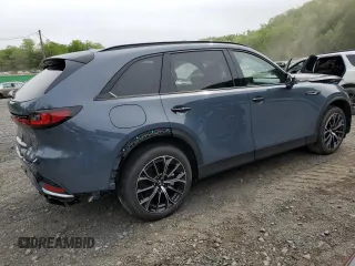 2025 Mazda CX-70 Premium z VIN JM3KJDHA6S1113577, wystawiony jako Copart lot #58787325 z przebiegiem 129 mil mil oraz Szkoda całkowita • Salvage title. Historia ofert i sprzedaży dostępna na DreamBid. Obrazek 3.