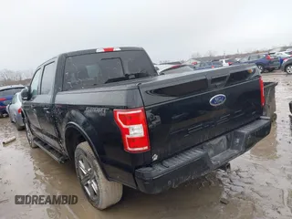 2018 Ford F-150 XL with VIN 1FTEW1E57JFA51993, listed as a IAAI auction lot 41620187 with 103,449 mi miles. Bid and sale history available at carsss.com. Image 3.
