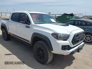 2019 Toyota Tacoma SR with VIN 5TFCZ5AN9KX207118, listed as a IAAI auction lot 42207515 with 72,270 mi miles and . Bid and sale history available at DreamBid. Image 1.