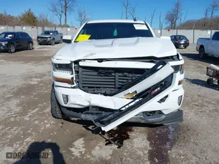 2018 Chevrolet Silverado 1500 LT with VIN 1GCVKREC5JZ350034, listed as a IAAI auction lot 41649277 with 112,673 mi miles. Bid and sale history available at carsss.com. Image 12.