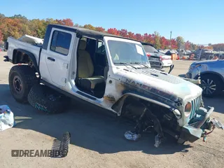 2020 Jeep Gladiator Sport S z VIN 1C6HJTAG3LL109494, wystawiony jako IAAI lot #40677949 z przebiegiem 52 079 mil mil oraz . Historia ofert i sprzedaży dostępna na DreamBid. Obrazek 1.