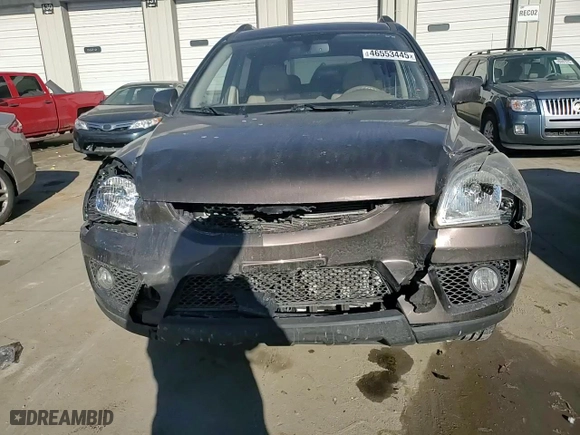 2009 Kia Sportage LX with VIN KNDJE723297613750, listed as a Copart auction lot 46553445 with 110,937 mi miles and Salvage Title. Bid and sale history available at carsss.com. Image 12.