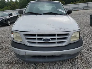 1999 Ford F-150 with VIN 1FTZX1728XNA67734, listed as a Copart auction lot 61195845 with Not provided miles and Salvage title. Bid and sale history available at DreamBid. Image 5.