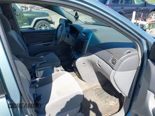 2009 Toyota Sienna CE with VIN 5TDZK23C29S275687, listed as a IAAI auction lot 42142599 with 140,729 mi miles. Bid and sale history available at carsss.com. Image 5.