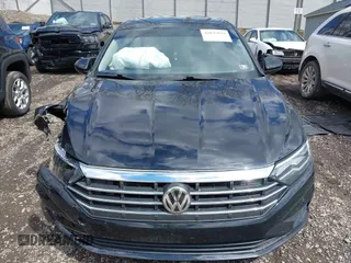 2021 Volkswagen Jetta S z VIN 3VWC57BU0MM035340, wystawiony jako IAAI lot #42045819 z przebiegiem 76 751 mil mil oraz . Historia ofert i sprzedaży dostępna na DreamBid. Obrazek 12.