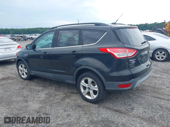 2014 Ford Escape SE with VIN 1FMCU9GX2EUB68419, listed as a IAAI auction lot 42741491 with Not provided miles and . Bid and sale history available at DreamBid. Image 3.