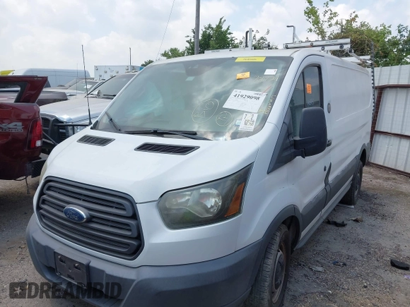 2016 Ford Transit Cargo z VIN 1FTYR1ZM5GKA09697, wystawiony jako IAAI lot #41929098 z przebiegiem 98 790 mil mil oraz . Historia ofert i sprzedaży dostępna na DreamBid. Obrazek 2.
