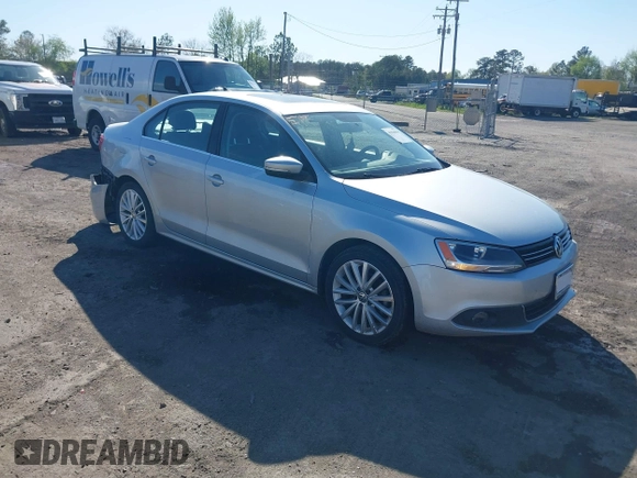 2014 Volkswagen Jetta TDI w/Premium with VIN 3VWLL7AJ2EM359341, listed as a IAAI auction lot 42030959 with 74,273 mi miles and . Bid and sale history available at DreamBid. Image 1.