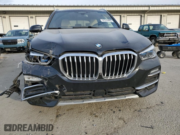 2021 BMW X5 xDrive45e with VIN 5UXTA6C07M9E59778, listed as a Copart auction lot 47310465 with 70,149 mi miles and Salvage Title. Bid and sale history available at carsss.com. Image 5.