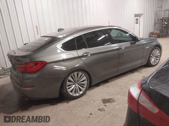 2014 BMW 5 Series 535i Gran Turismo xDrive z VIN WBA5M4C59ED183503, wystawiony jako IAAI lot #41983117 z przebiegiem 136 186 mil mil oraz . Historia ofert i sprzedaży dostępna na DreamBid. Obrazek 4.
