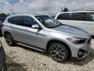 2021 BMW X1 sDrive28i with VIN WBXJG7C04M5S29295, listed as a Copart auction lot 48922203 with 14,214 mi miles. Bid and sale history available at carsss.com. Image 4.