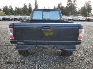 1997 Ford Ranger XLT with VIN 1FTCR15X8VPB38589, listed as a Copart auction lot 80037124 with 212,826 mi miles and Salvage Title. Bid and sale history available at DreamBid. Image 6.